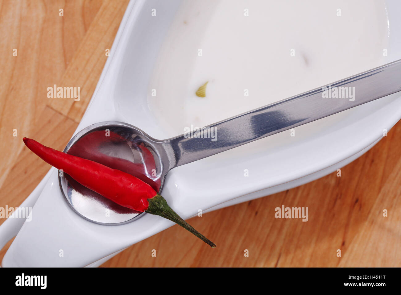 Chilli pod, soup spoon, Stock Photo