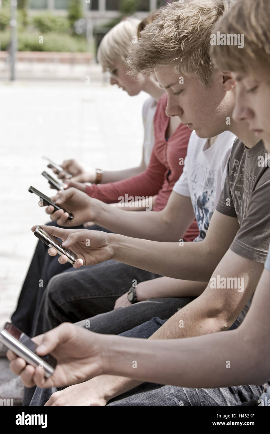 City, teenagers, mobiles, group picture, Stock Photo