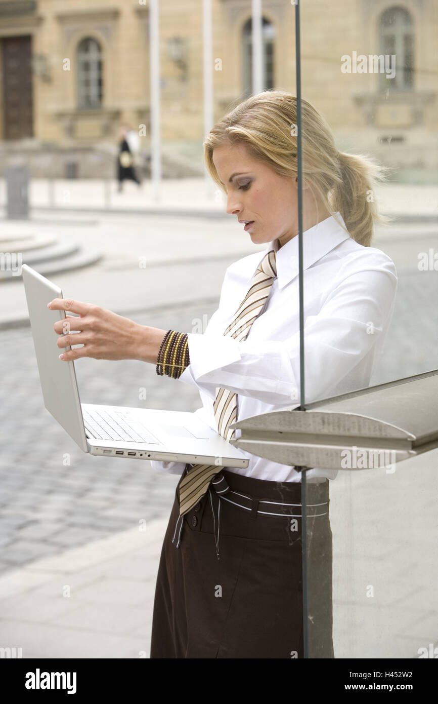 Sidewalk, businesswoman, notebook, data retrieval, Stock Photo