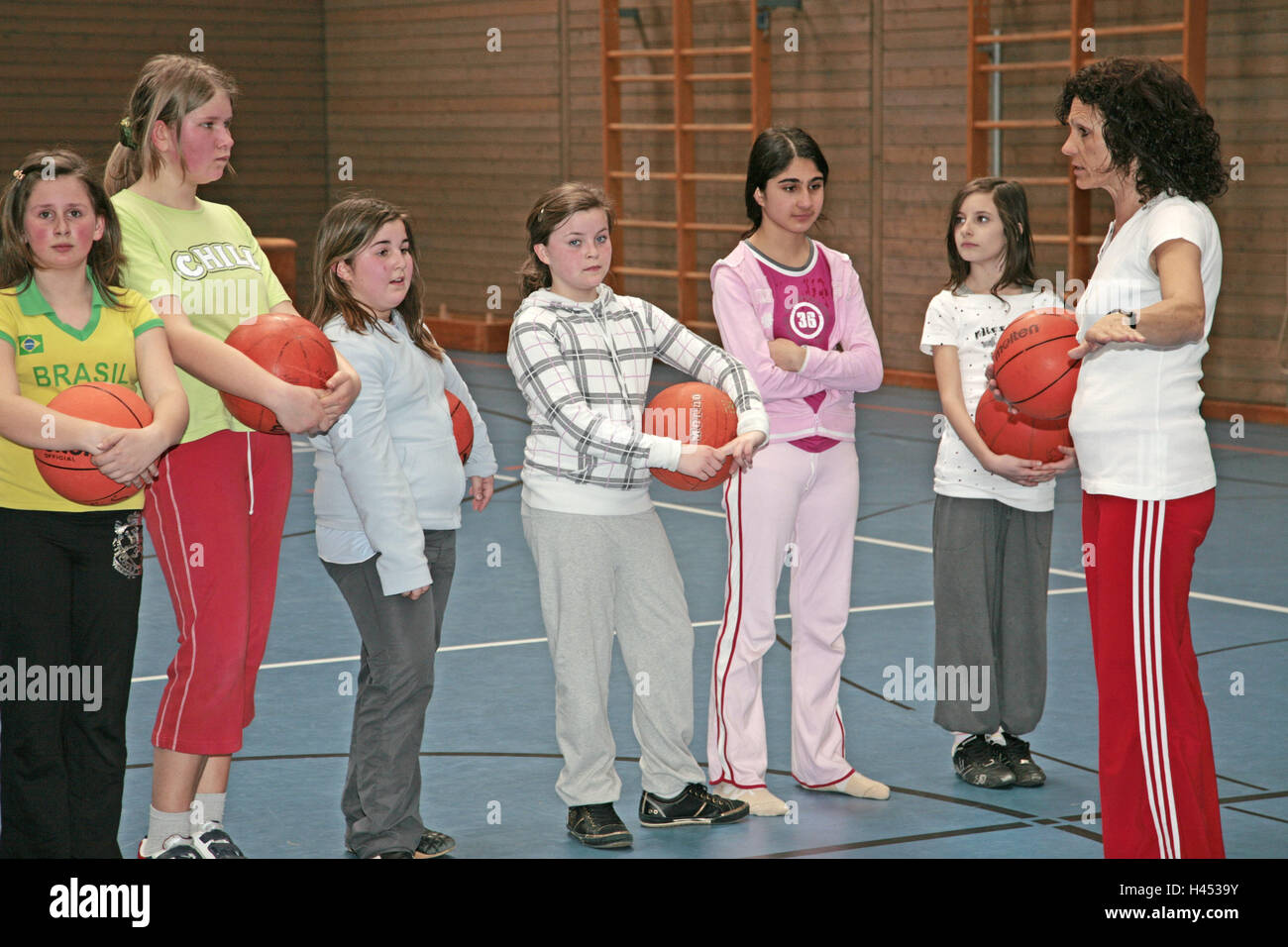 Gymnasium, school sport, girl, basketball, hold, teacher, discussion