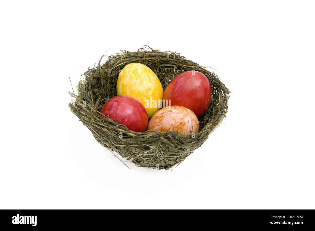 Easter nest, eggs, brightly, four, cut out, Easter, Easter feast, custom, Easter custom, traditions, nest, Easter eggs, colorfully, yellow, red, orange, hay, hay nest, conception, childhood, product photography, studio, Stock Photo