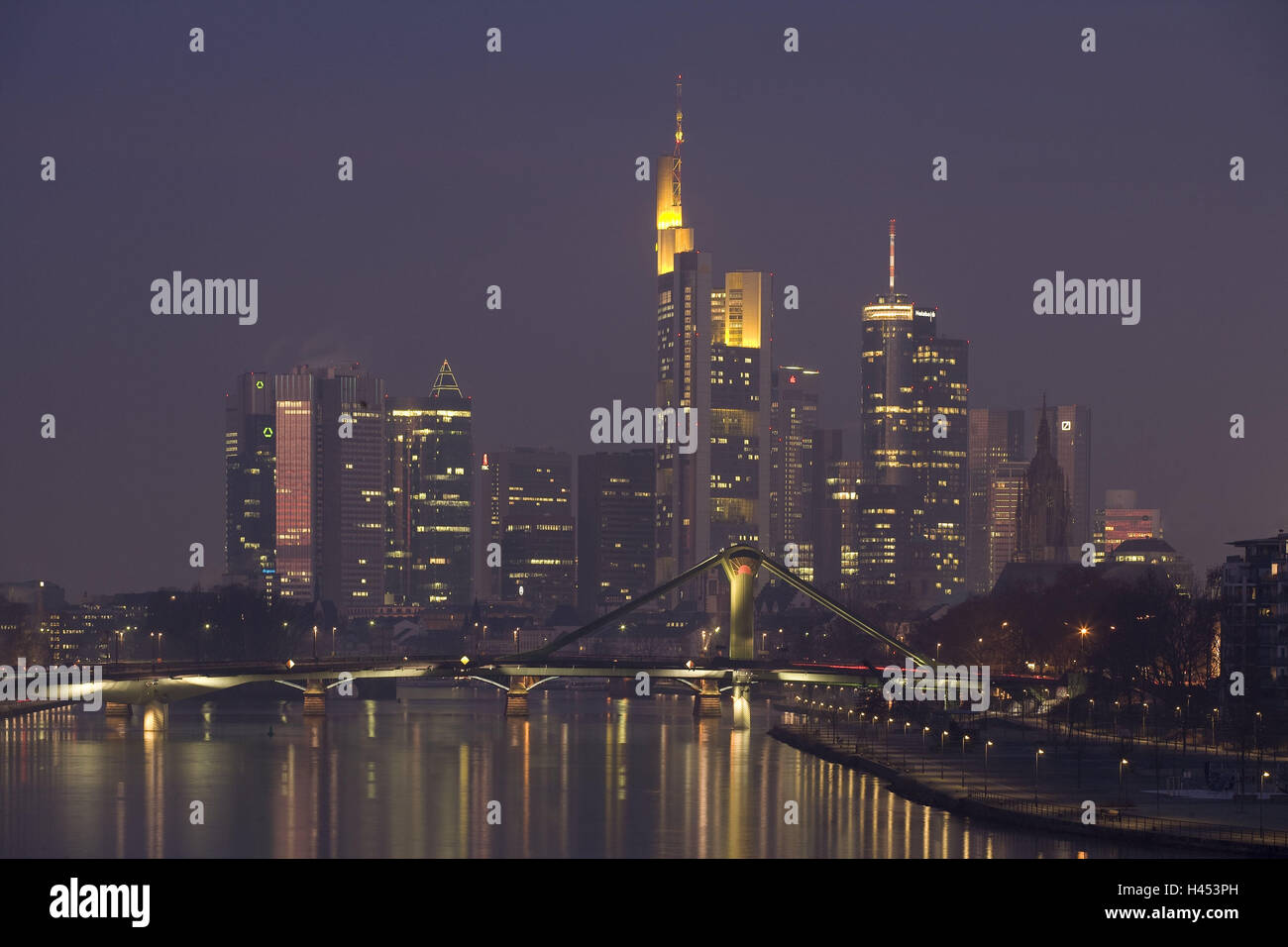 Germany, Hessen, Frankfurt on the Main, town view, skyline, river Main, lighting, evening, town, city, metropolis, financial metropolis, architecture, houses, buildings, high rises, high-rise office blocks, office buildings, outside, urban, urbane, lights, bridge, mirroring, water surface, Stock Photo
