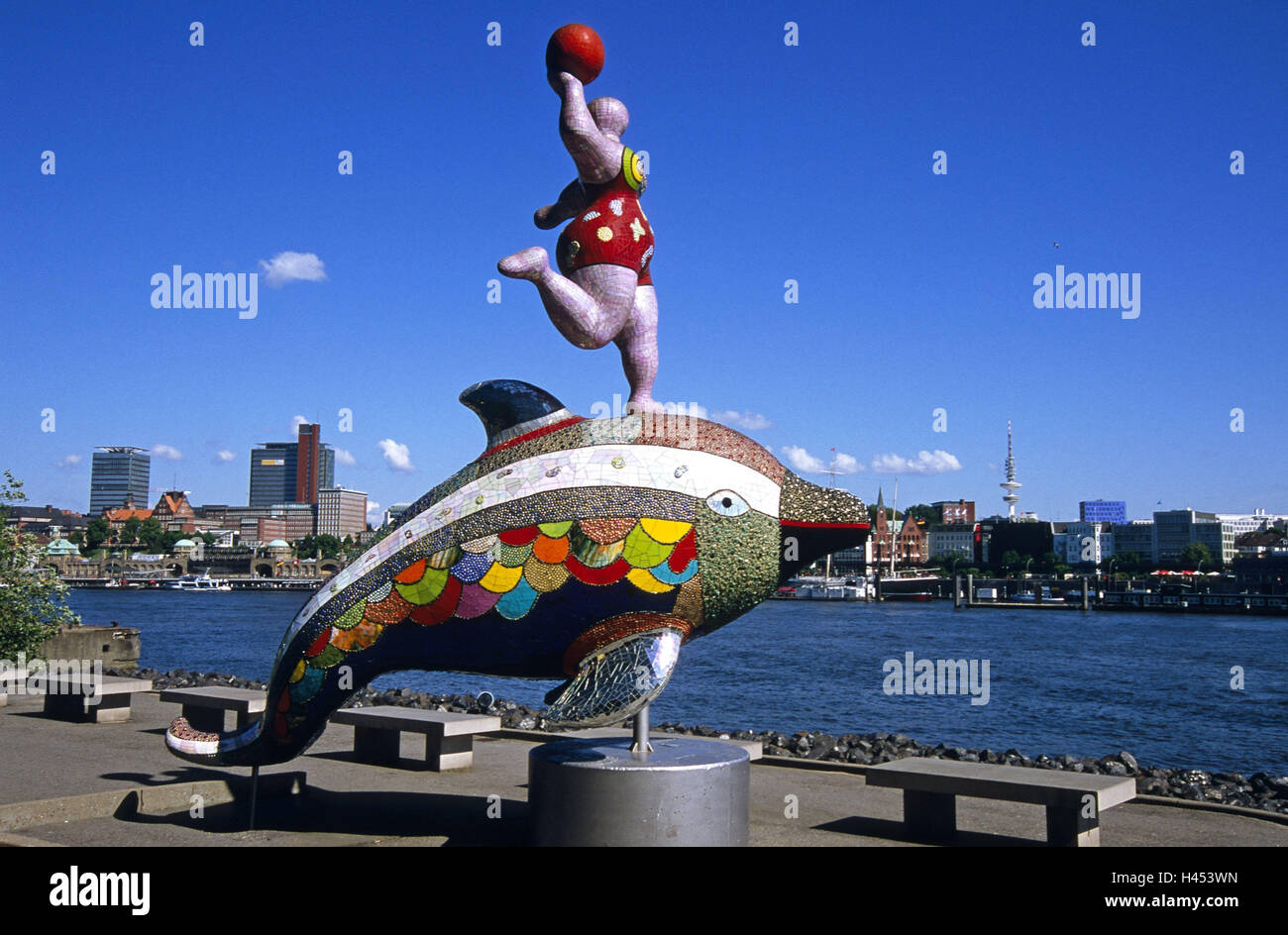 Germany, Hamburg-Steinwerder, the Elbe, harbour, dolphin's figure, Hamburg, part town, Steinwerder, Elbufer, stone benches, concrete benches, saddles, culture, art, St. art, women's figure, dolphin, figure, sculpture, 'Nana', Nana sculpture, plastic, brightly, mosaic, ball, tourism, place of interest, St. art, Elbpanorama, town view, sunshine, shade, Stock Photo