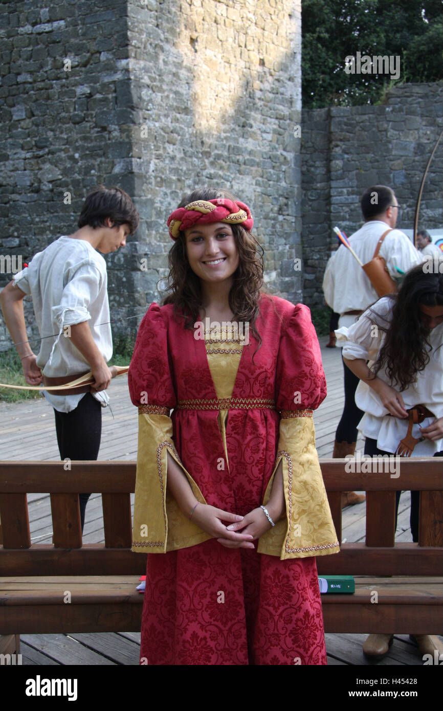 Italy, Tuscany, Montecatini Alto, castle, festival performance, Middle  Ages, woman, costumes, no model release, town, destination, upper town,  mountain village, Middle Ages game, medievally, actor, clothes, spinster,  castle lady, stand, smile, outside,