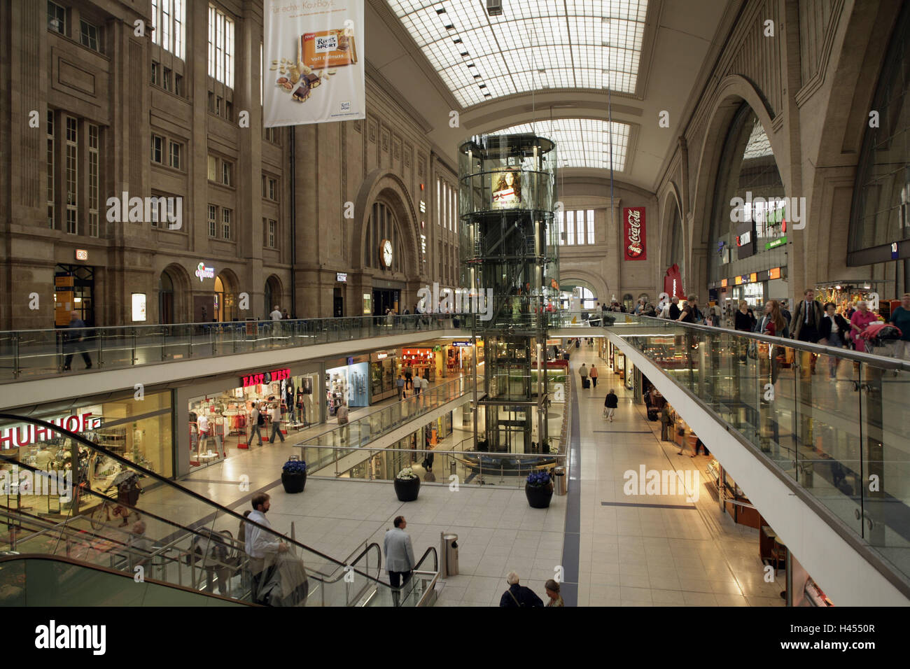 Germany, Saxony, Leipzig, central station, shopping centre, town, city, destination, railway station, shopping, purchasing, inside, architecture, shops, gallery, person, escalator, glass roof, Stock Photo