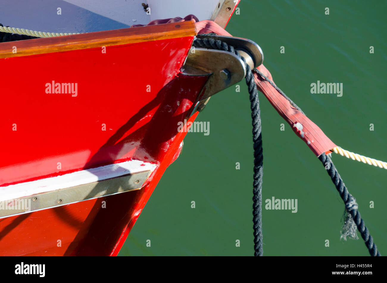 Bow of red boat, Havelock, Pelorous Sound, Marlborough Sounds, South Island, New Zealand Stock Photo