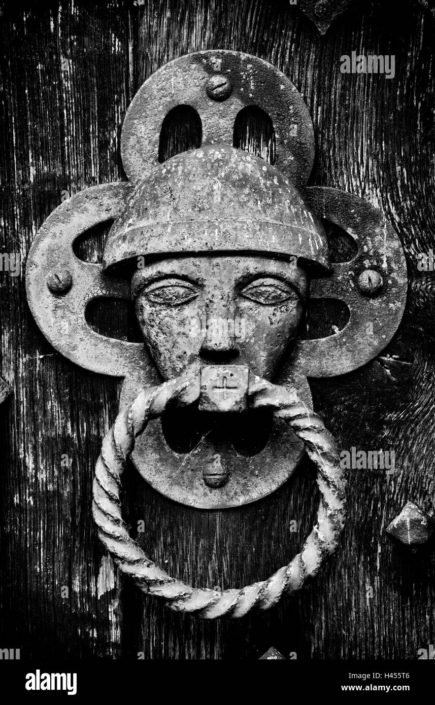 Church door face handle. Wasperton, Warwickshire, England. Black and white Stock Photo