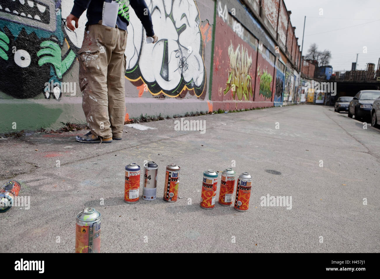 Sprayer, paint tins, wall, graffiti Stock Photo Alamy