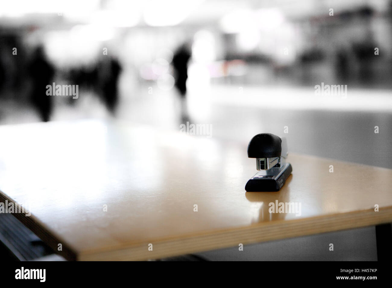 Stapler on an empty desk, Stock Photo