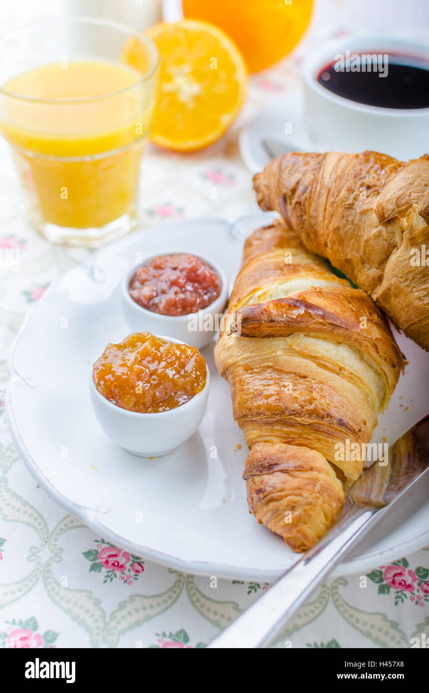 French breakfast croissant with coffee, jam and orange juice Stock
