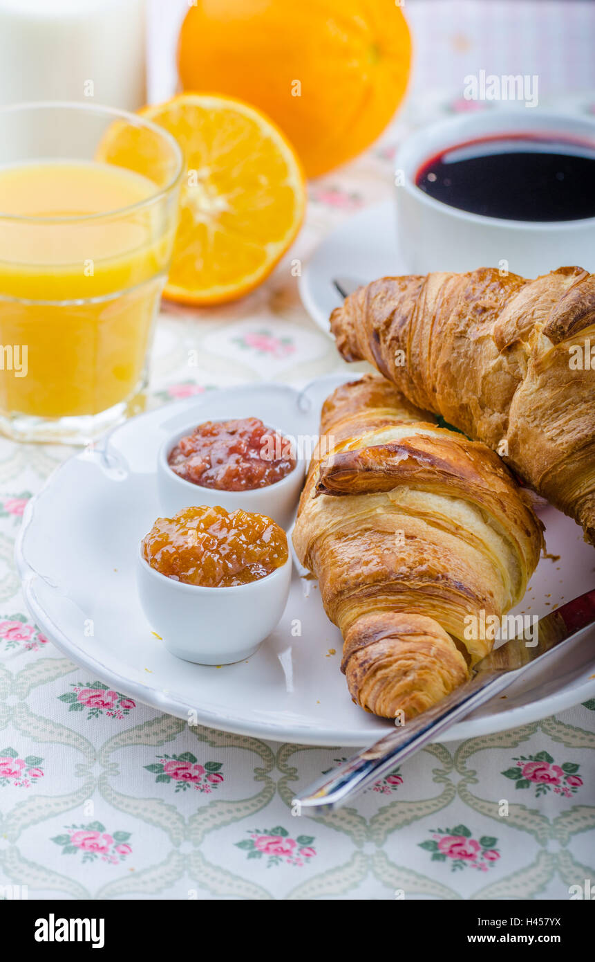 French breakfast croissant with coffee, jam and orange juice Stock