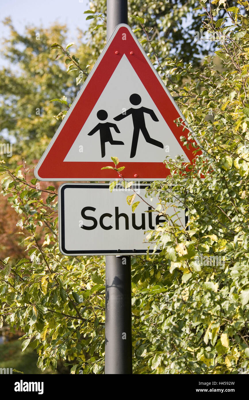 Traffic sign, caution school respect hedge sign children, sign, school-beginning, school, schoolchildren, school-way, schooldays, traffic, traffic, road safety, highway, traffic signs, caution, signs, bushes, sunny, outside, Stock Photo