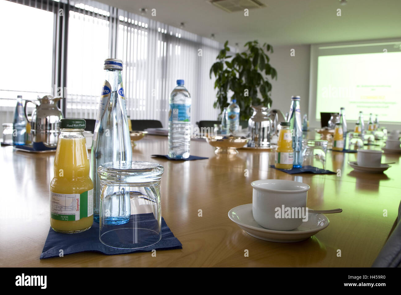 Conference room, table, glasses, cups, drinks, windows, deserted