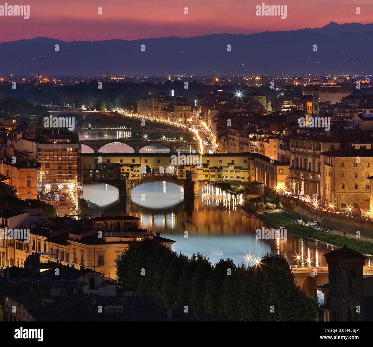 The River Arno And The Ponte Vecchio In The City Of Florence At Night The River Arno And The Ponte Vecchio In The City Of Florence At Night