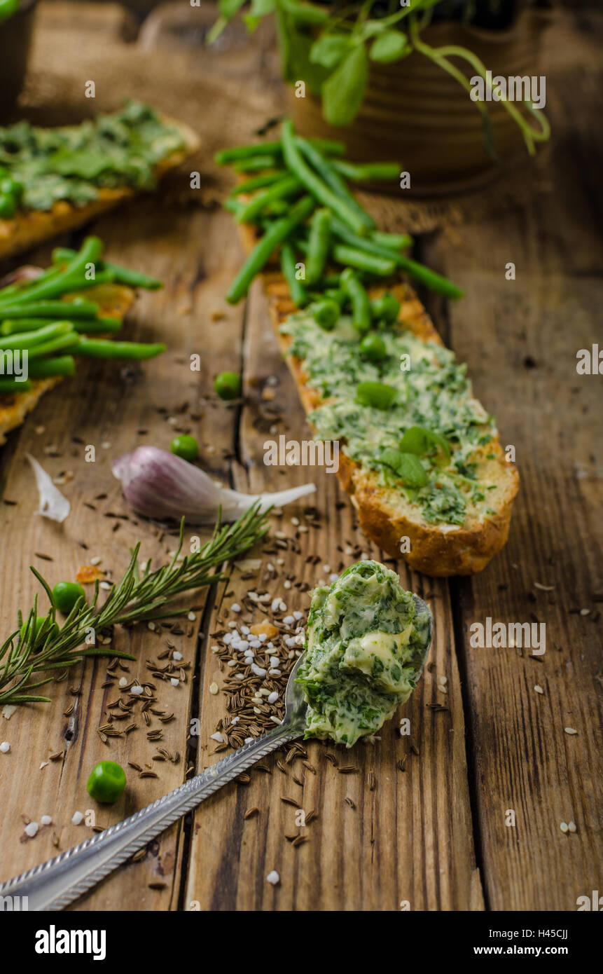 Healthy rustic baguette with herb butter and vegetables Stock Photo Alamy