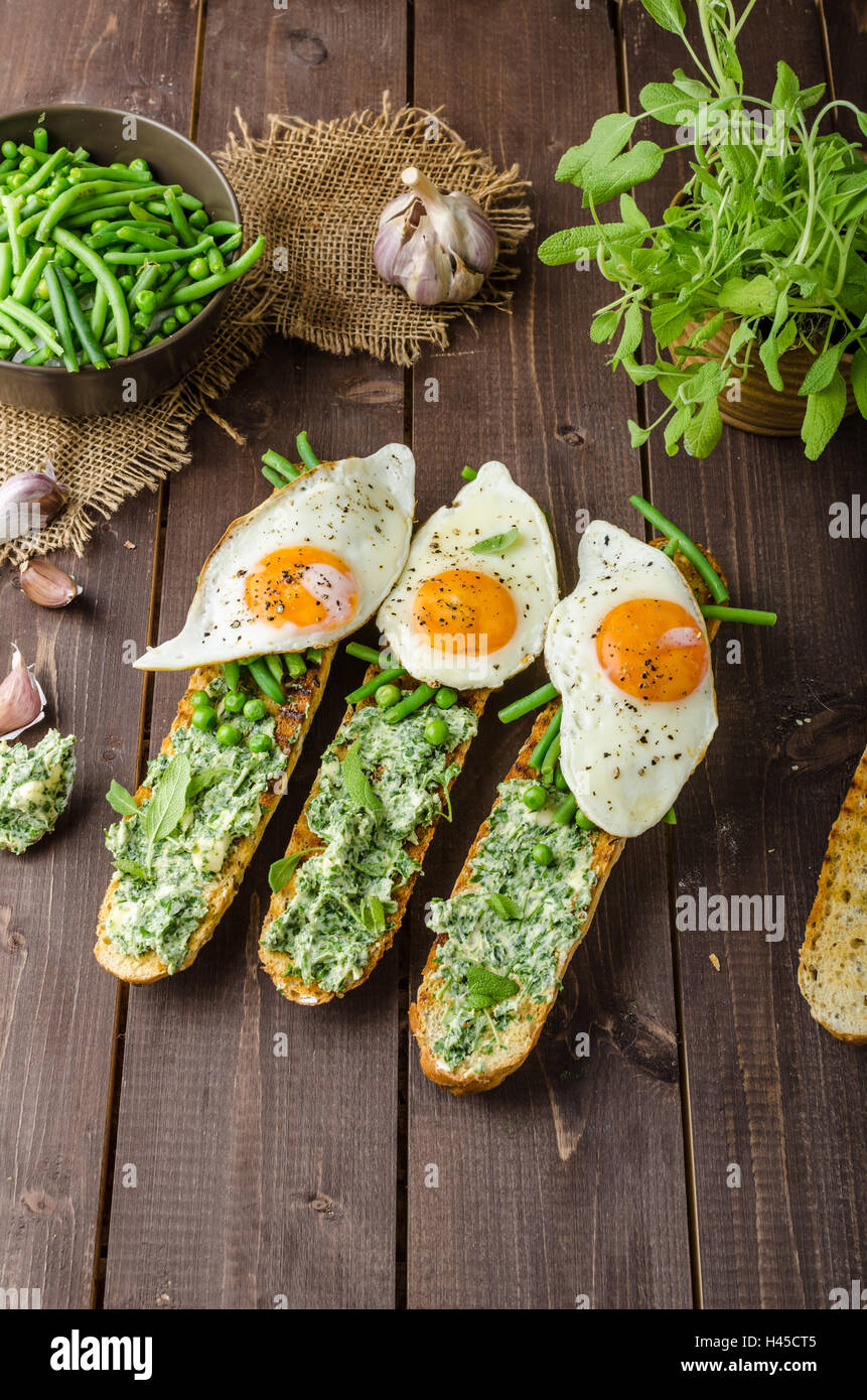 Healthy rustic baguette with herb butter and vegetables Stock Photo Alamy