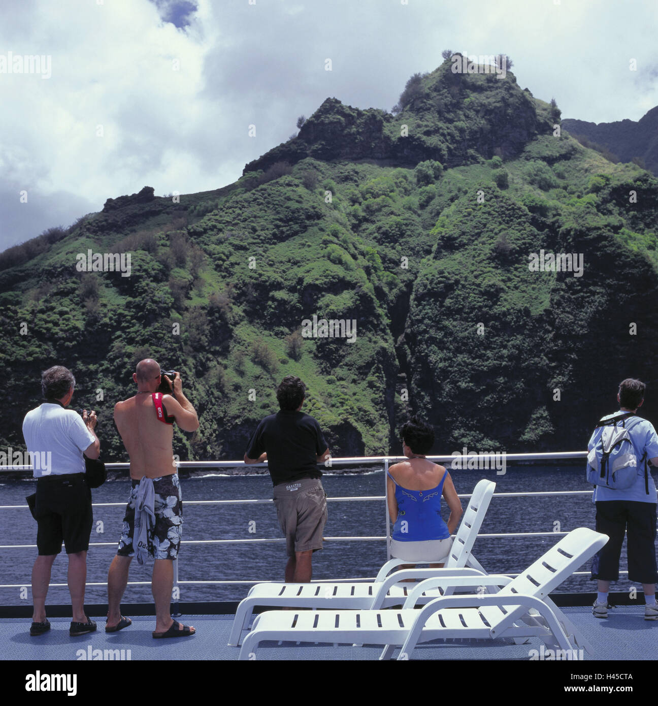 French Polynesia, Tahuata, Costa Tu Vaitahu, ship cap, tourist, back view, holiday ship, ship, deck, person, stand, take photos, boat tour, navigation, travel, vacation, tourism, Stock Photo
