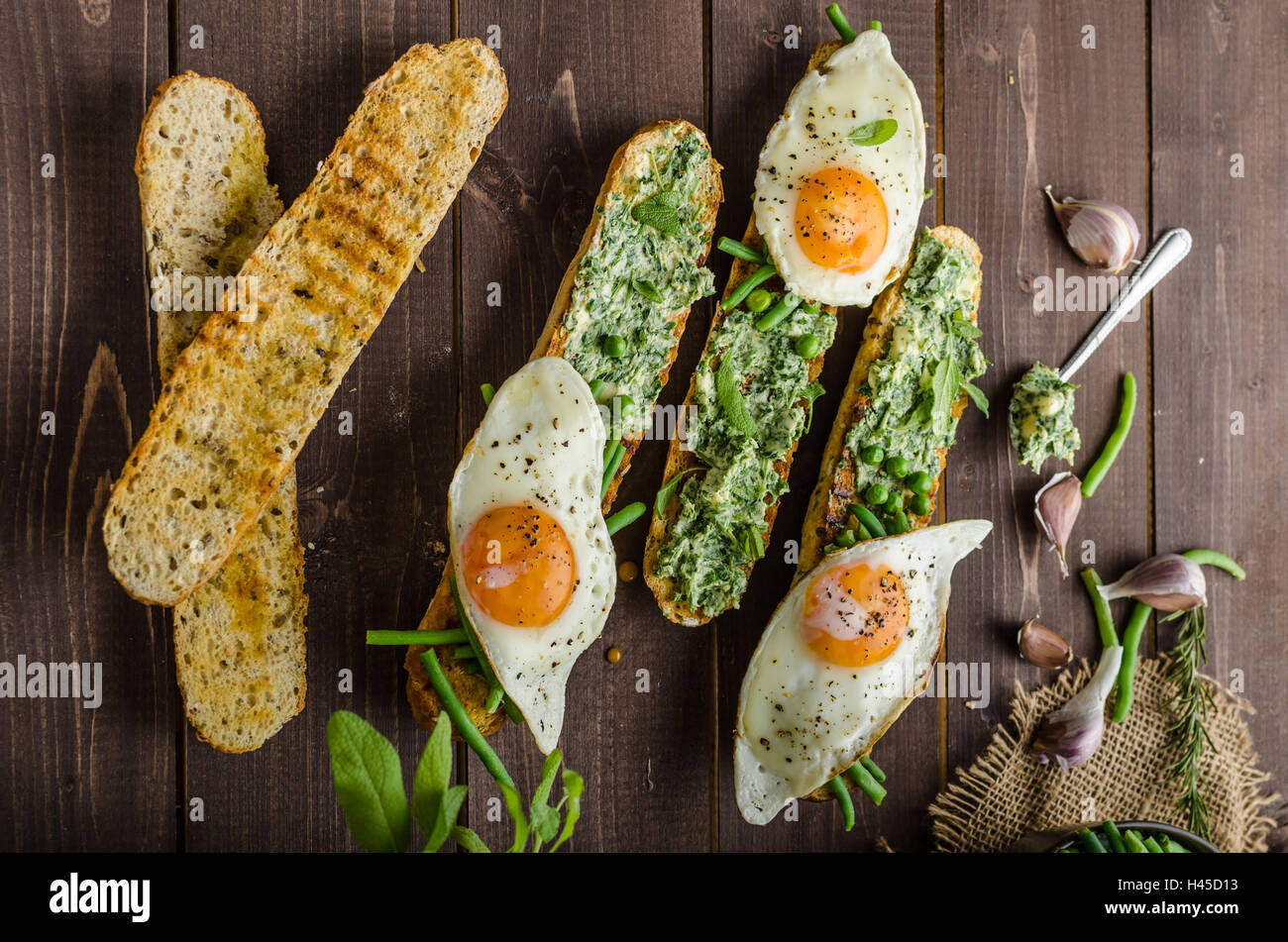 Healthy rustic baguette with herb butter and vegetables Stock Photo Alamy