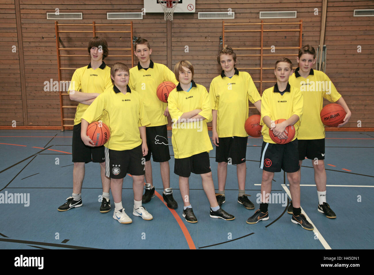 Gymnasium, school sport, boy, basketball, team, balls, hold, model released, people, inside, school, seven, team, group, team's recording, basketball, team's jerseys, youth, sport, school sport, team, training, condition, motion, perseverance, sports club, togetherness, social behaviour, fairness, team sport, sport, ball game, whole body, Stock Photo