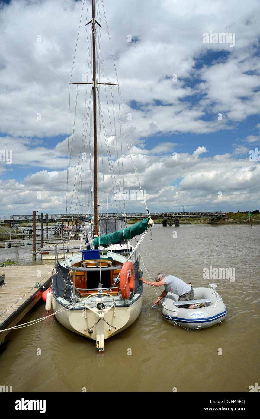 cleaning bottom of boat southwold Stock Photo Alamy