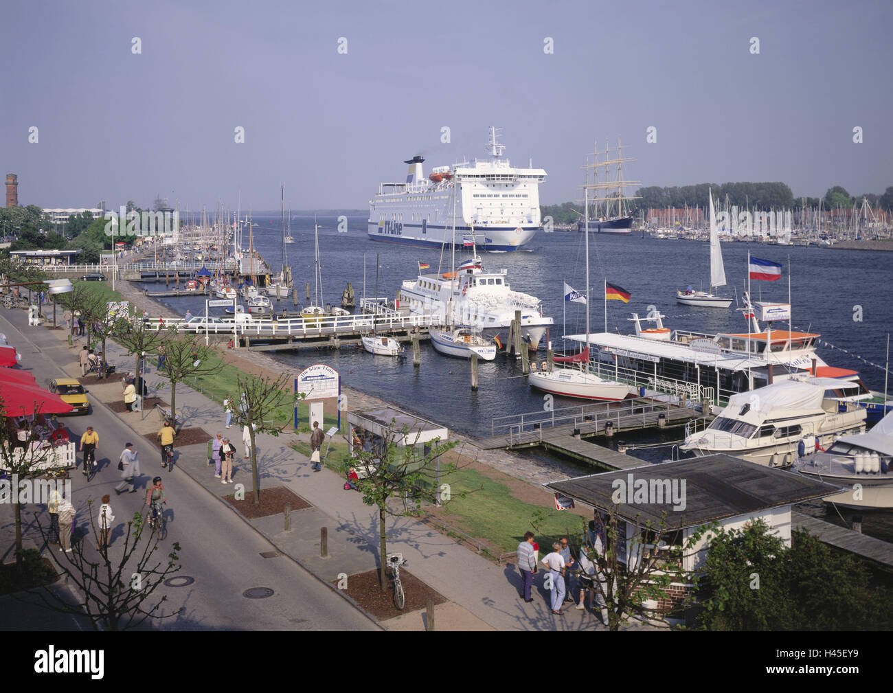 Germany, Schleswig - Holstein, Travemünde, harbour, ships, cruise ship 'Nils Holgersson', North Germany, the Baltic Sea, destination, place of interest, landing stage, boots, sailing ships, motorboats, sea, water, ferry, ferryboat, four-masted sailing ship, schooner, person, tourist, Stock Photo