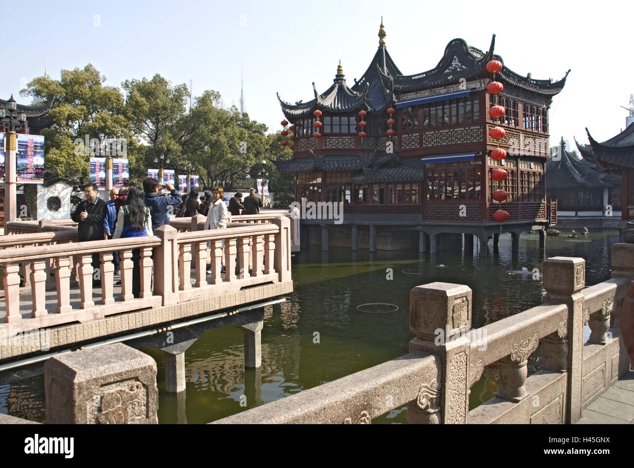 China, Shanghai, part town Nanshi, Huxinting teahouse, lake, zigzag bridge, visitor, no model release, Stock Photo