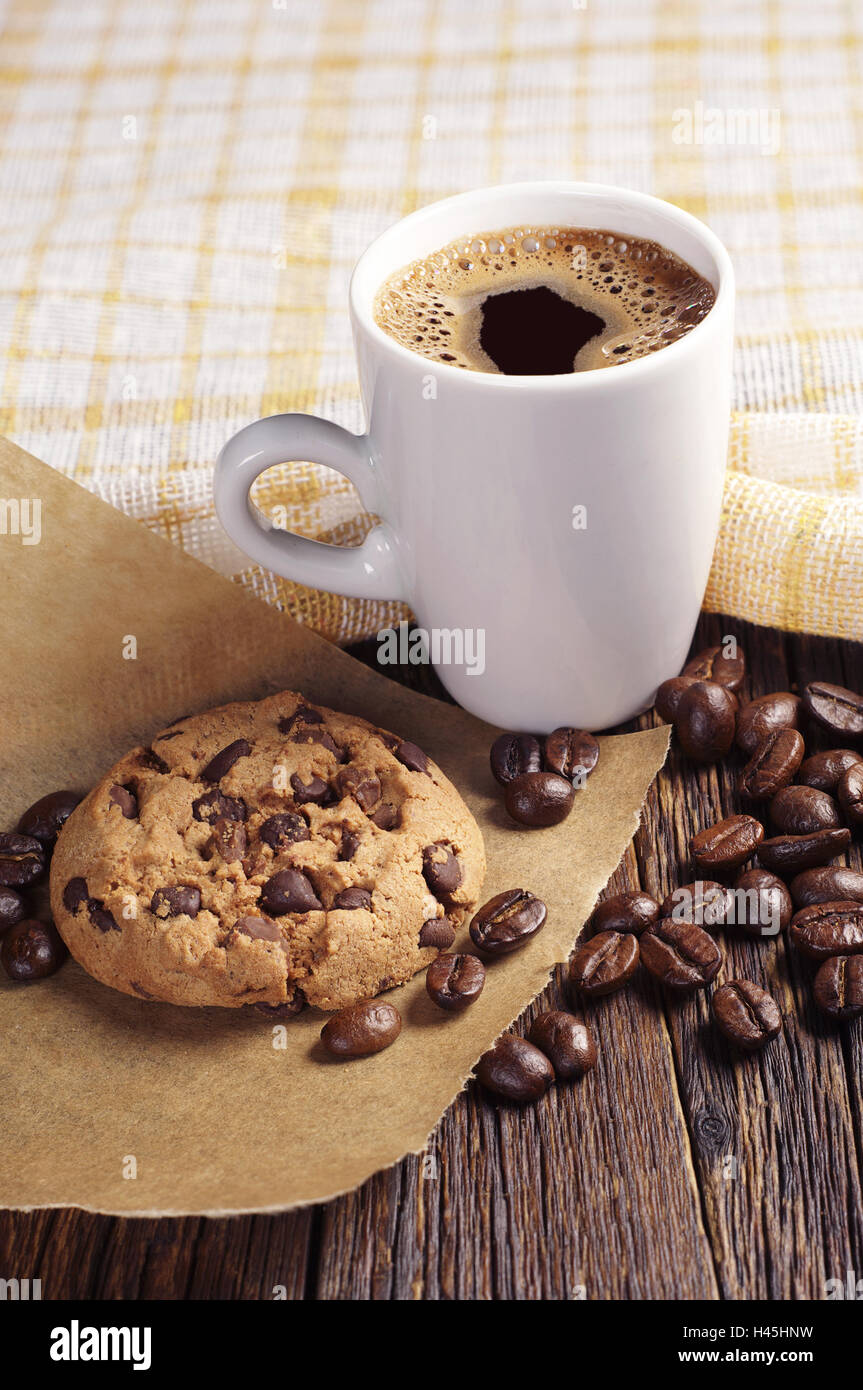 Cookie with chocolate and coffee on dark wooden table covert tablecloth Stock Photo