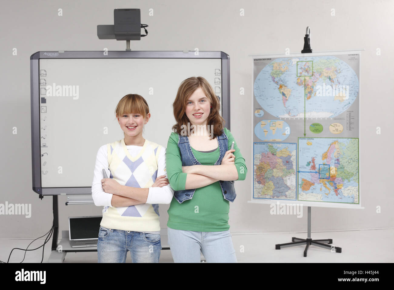 Schoolgirls, Whiteboard, map the world, vertical, Stock Photo