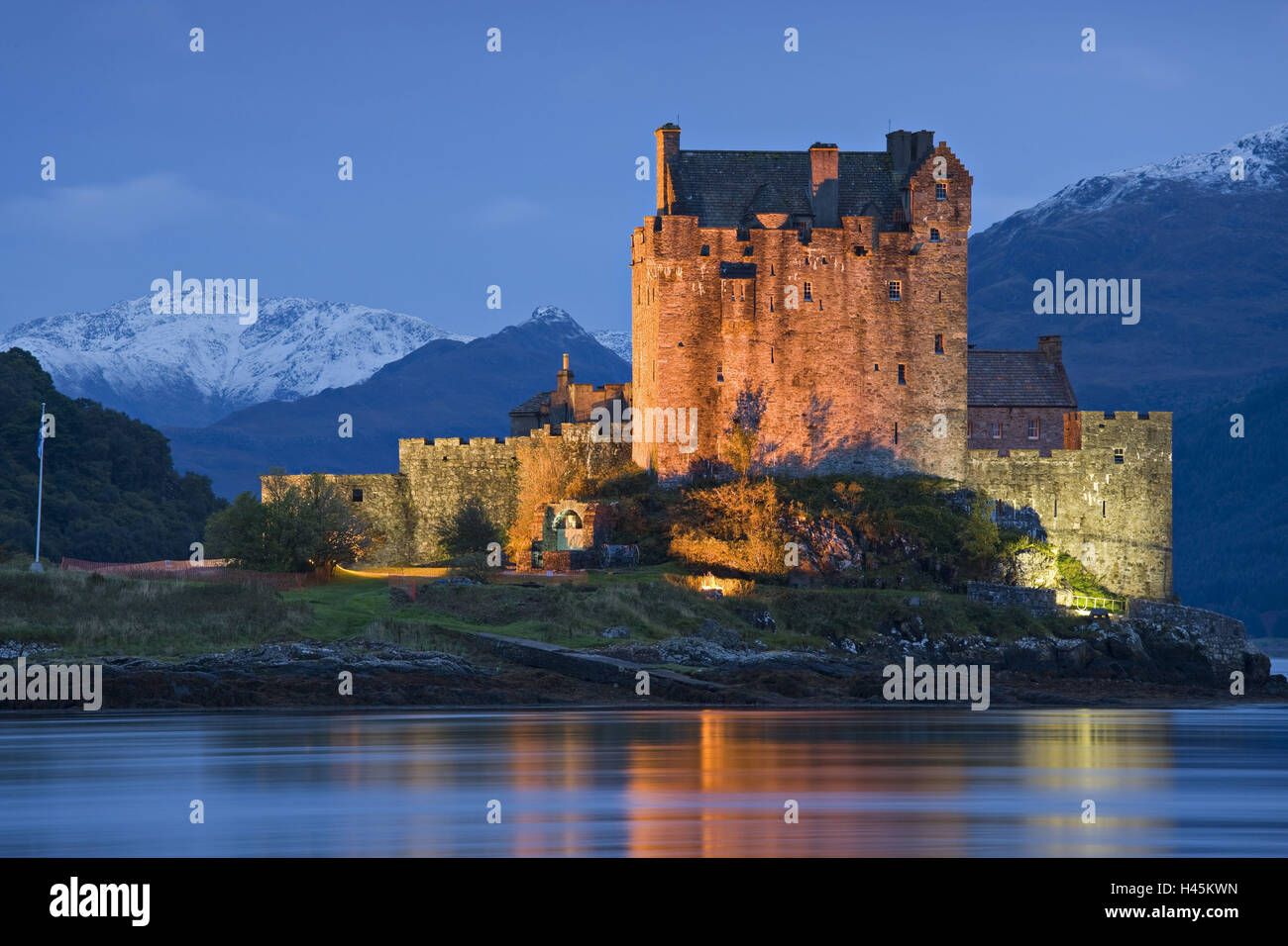 UK, Scotland, Invernessshire, Eilean Donan Castle, lighting, evening, mountains, snow, Stock Photo