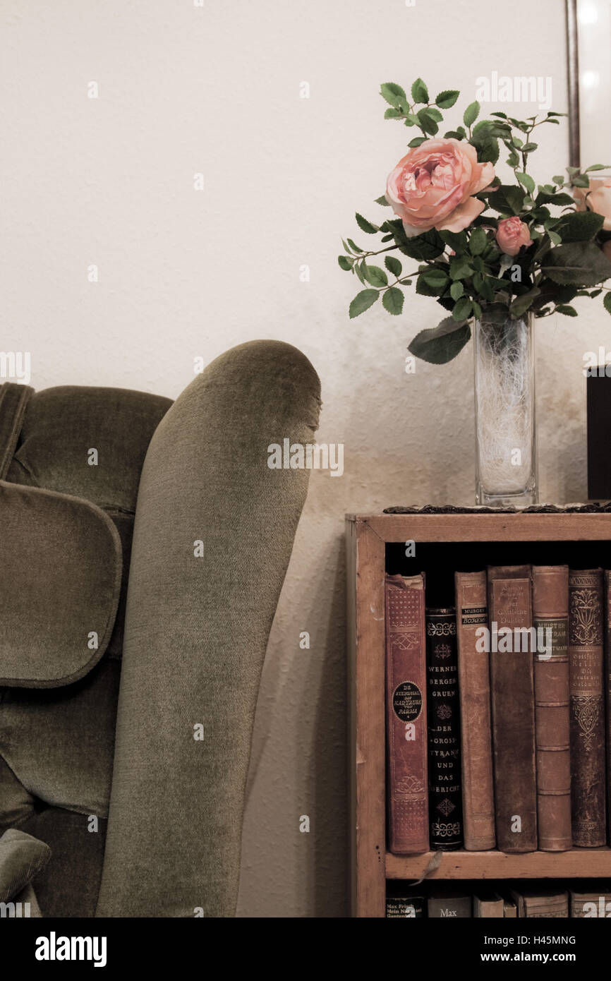 Armchair, bookshelf, books, old, flower vase Stock Photo Alamy