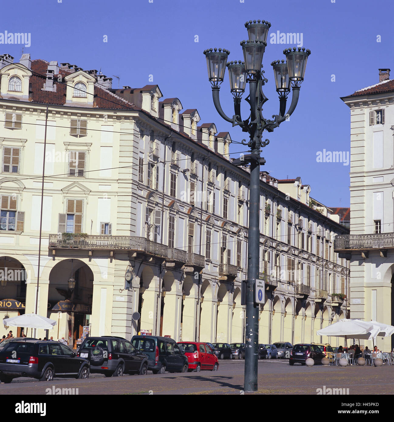 Italy, Piedmont, Turin, via bottom, building, arcades, cars, lantern, town, destination, place of interest, architecture, curves, round arches, arcade, street lamp, street cafe, person, Stock Photo