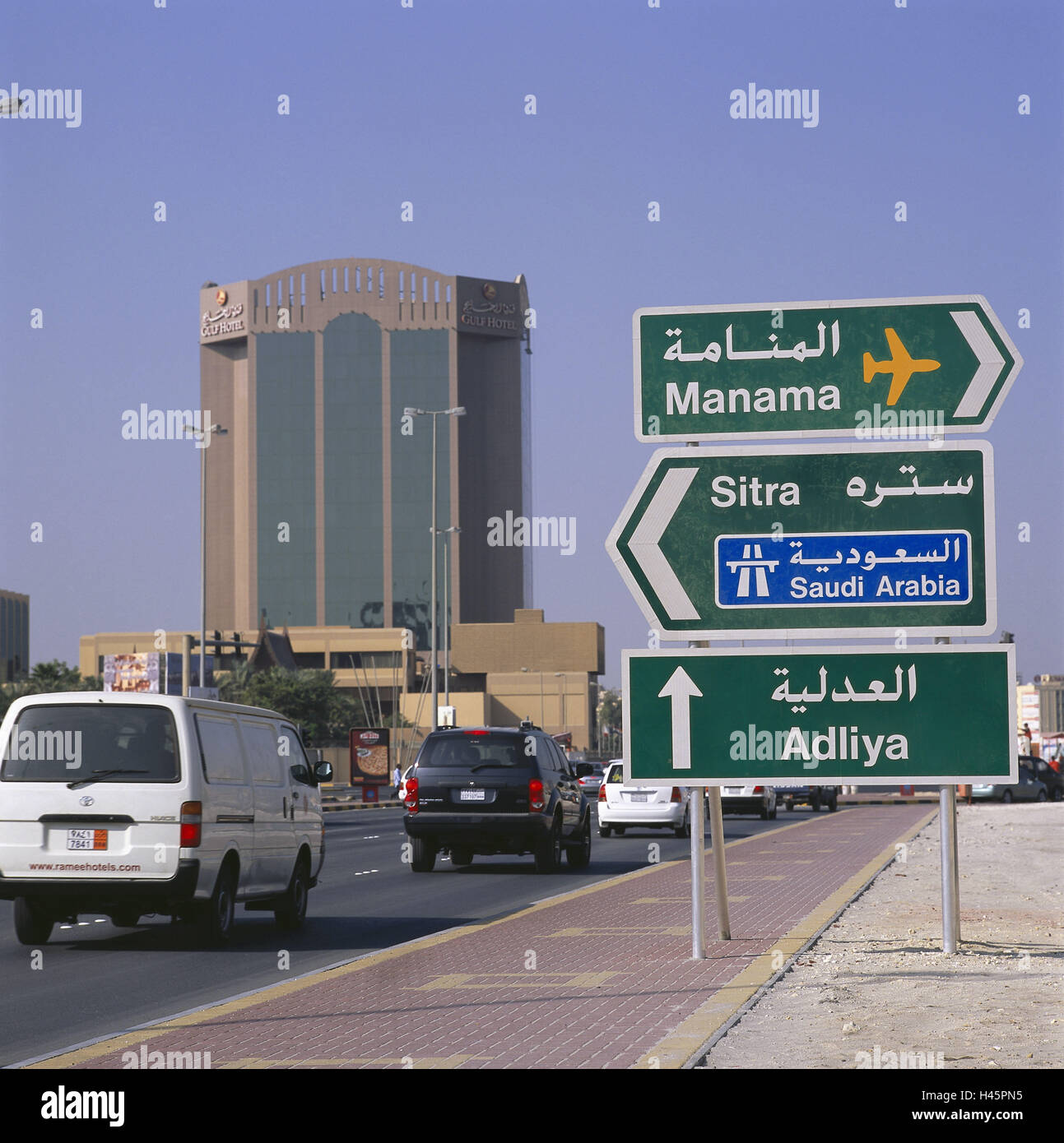 Bahrain, island Muharraq, high rise, street, traffic, signpost, island state, sheikdom, destination, building, architecture, hotel, hotel building, traffic, cars, signs, road signs, airport, highway, towns, Stock Photo