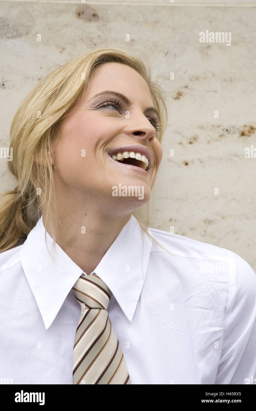 Business woman lean on wall hi-res stock photography and images - Alamy