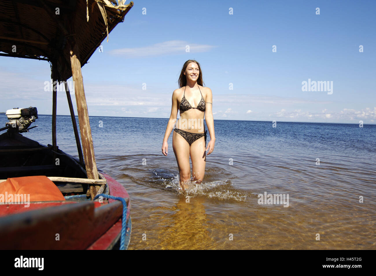 Woman, young, bikini, sea, fishing boat, Stock Photo