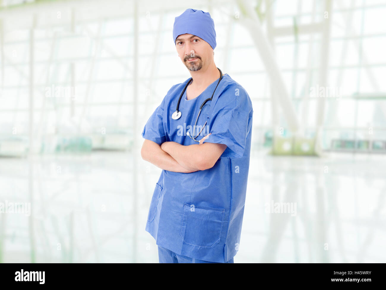 Smiling male doctor at the hospital Stock Photo - Alamy