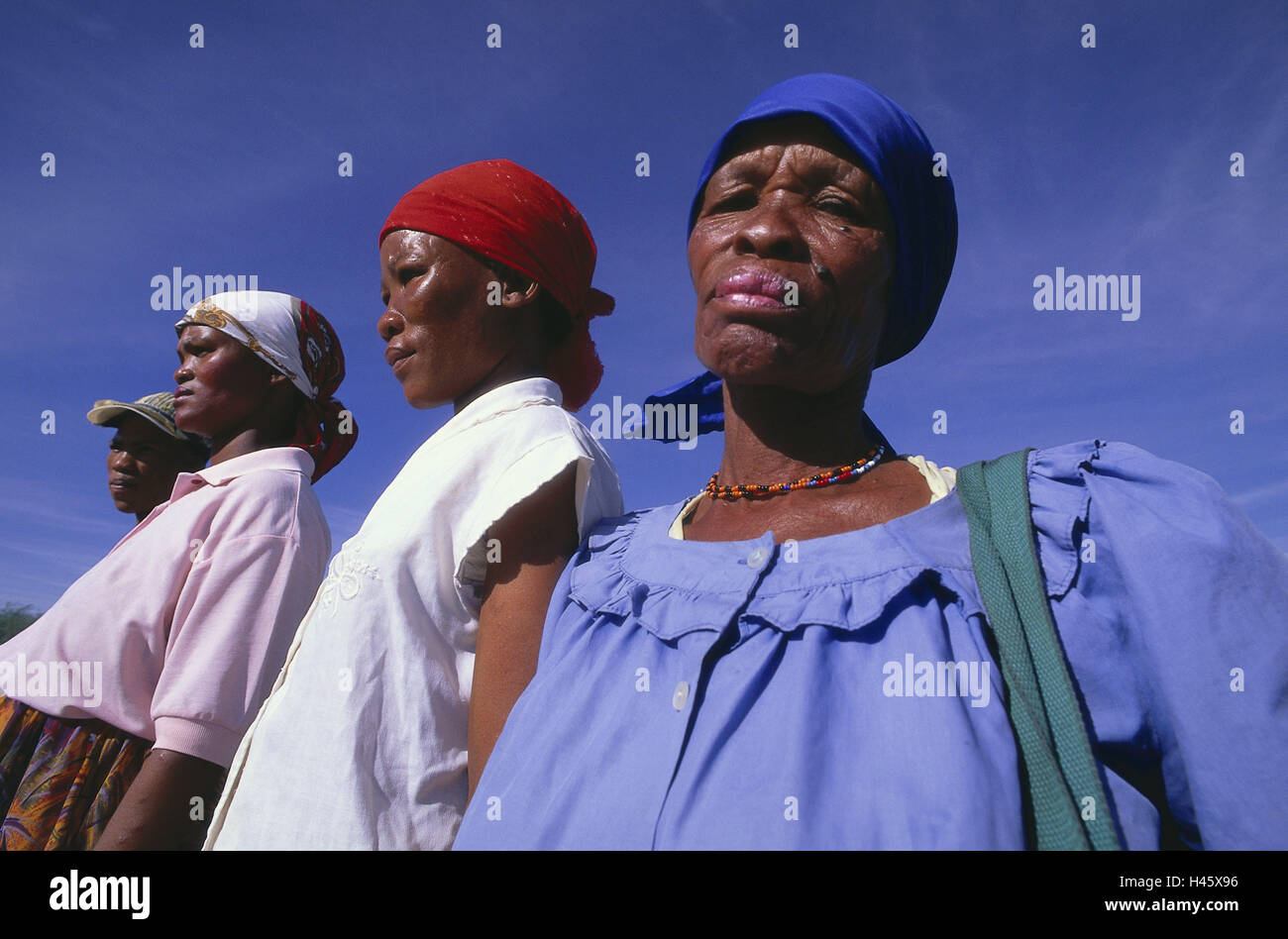 Botswana, women, portraits, clothes, brightly, clothes, headscarfs, headgear, locals, heavens, cloudless, blue, people, Stock Photo