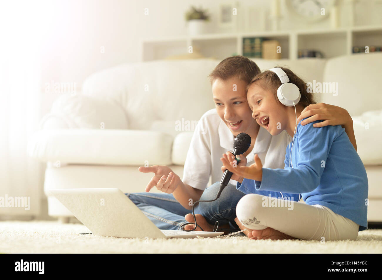 Children with laptop at home Stock Photo - Alamy