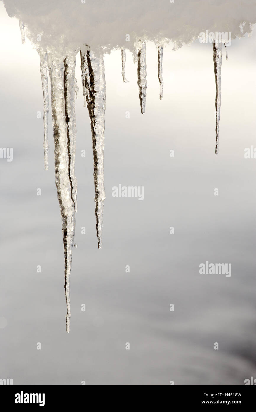 Icicles, seasons, nature, winter, snow, ice, froze, forms, samples, winter's day, glitter, hang cold, frost, icily, frosty, coldly, nobody, climate, temperatures, points, pointed, plugs, transparent, clearly, untouched, medium close-up, roof, Stock Photo
