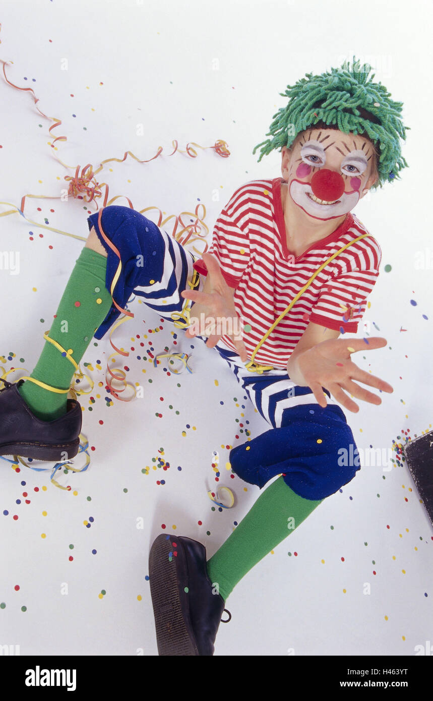 Carnival, child, disguise, costume, clown, sitting, confetti, throwing up, Stock Photo