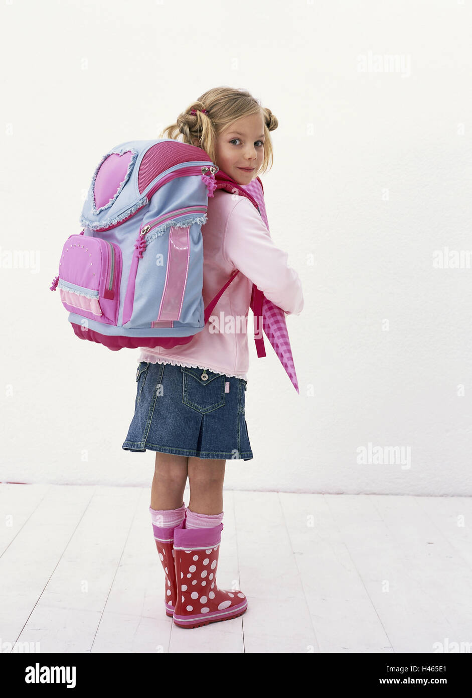 Enrolment, girl, school bag, hold, smile, happy, proudly, view shoulder,  back view, school, elementary school, beginning term, people, child, blond,  hairstyle, plaits, happy, joy, school child, schoolgirl, primary pupil,  first grader, atomic,