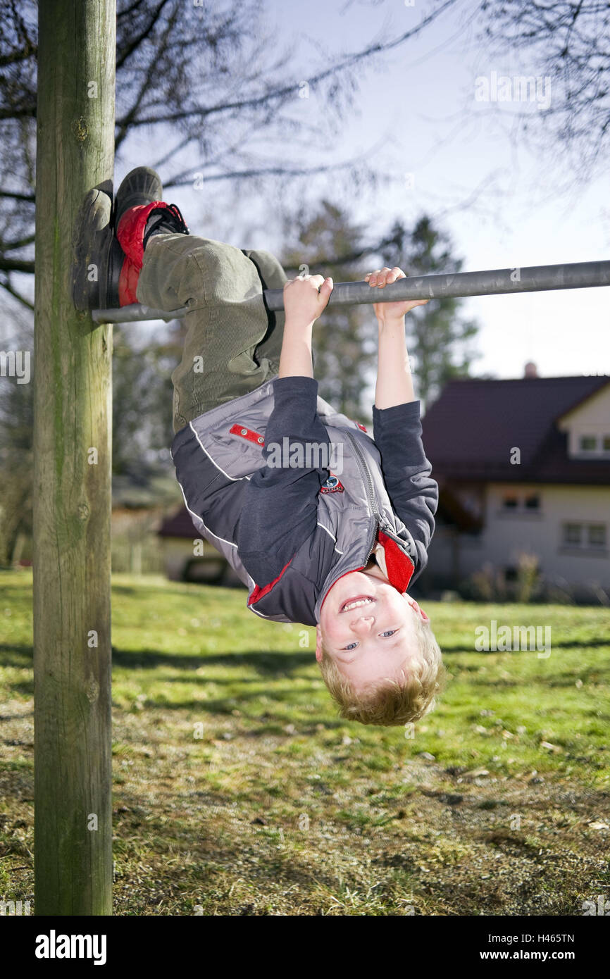 Playground, boy, sliding pole, hang, headlong, people, child, infant, childhood, leisure time, children's playground, louse's jack, rascal, climb, stick, balance, work the way along, hold stop, there, smile, motion, outside, happy, whole bodies, Stock Photo