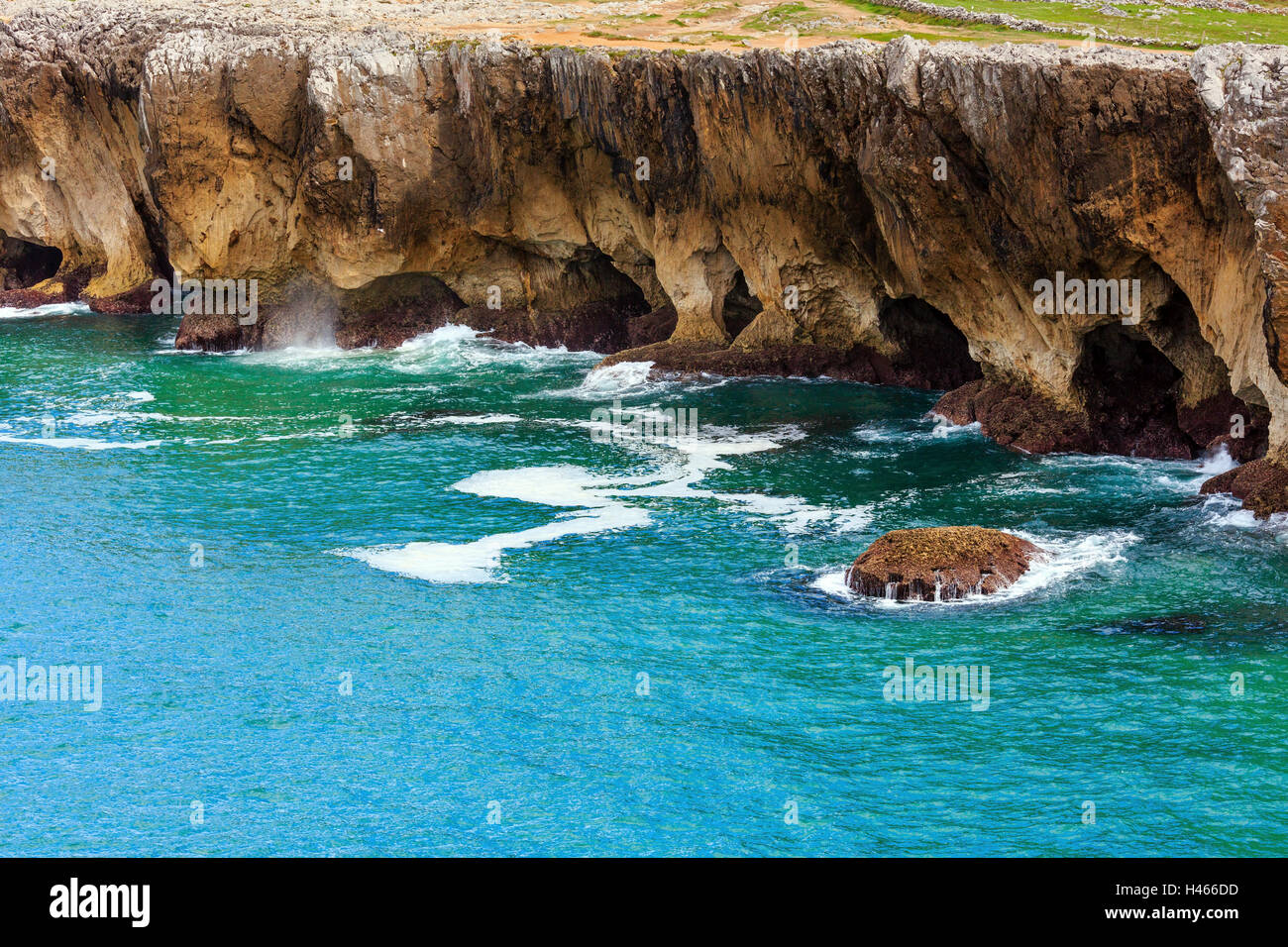 Rocky coast (closeup) and sea water with foam Stock Photo - Alamy