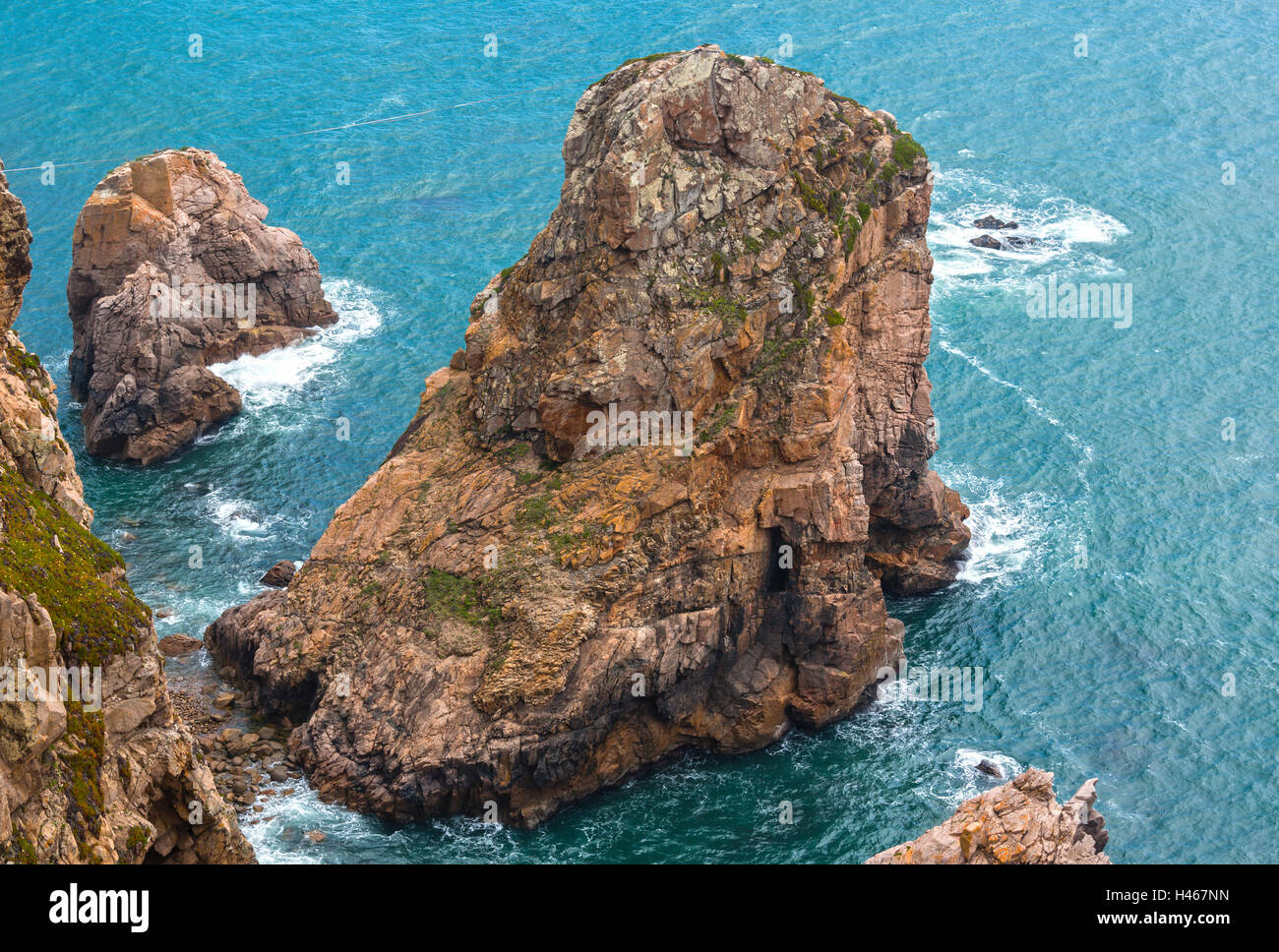 Boulders near shore. Atlantic ocean coast. View from Cape Roca (Cabo da Roca), Portugal. Stock Photo