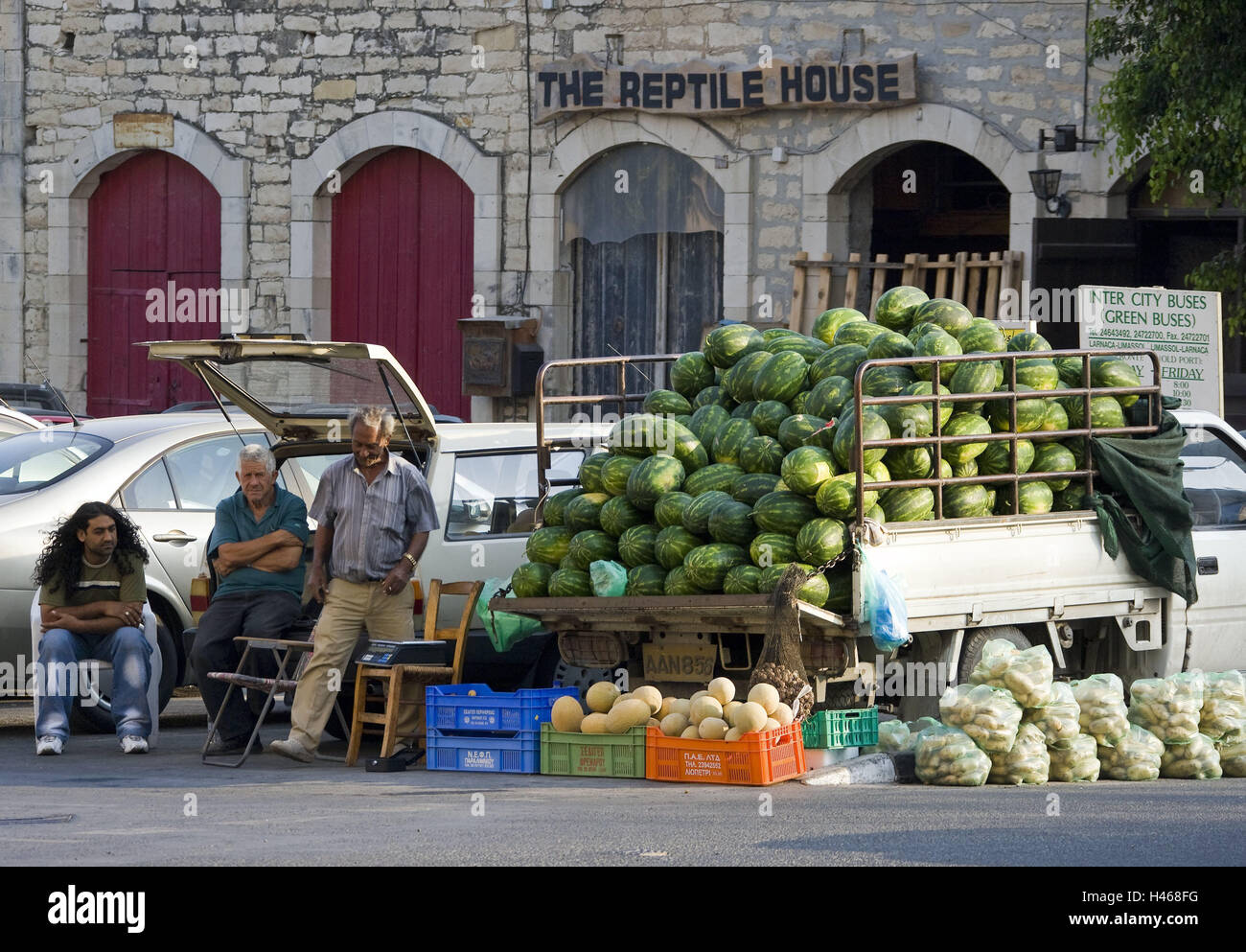 Cyprus, Limassol, reptile house, parking space, farmers, street vendors, melons, potatoes, Southern Cyprus, Lemesos, city, town, greek, buy, buy, trade, traders, agribusiness, agriculture, watermelons, cantaloupes, many offer, wait Men people locals truck Stock Photo