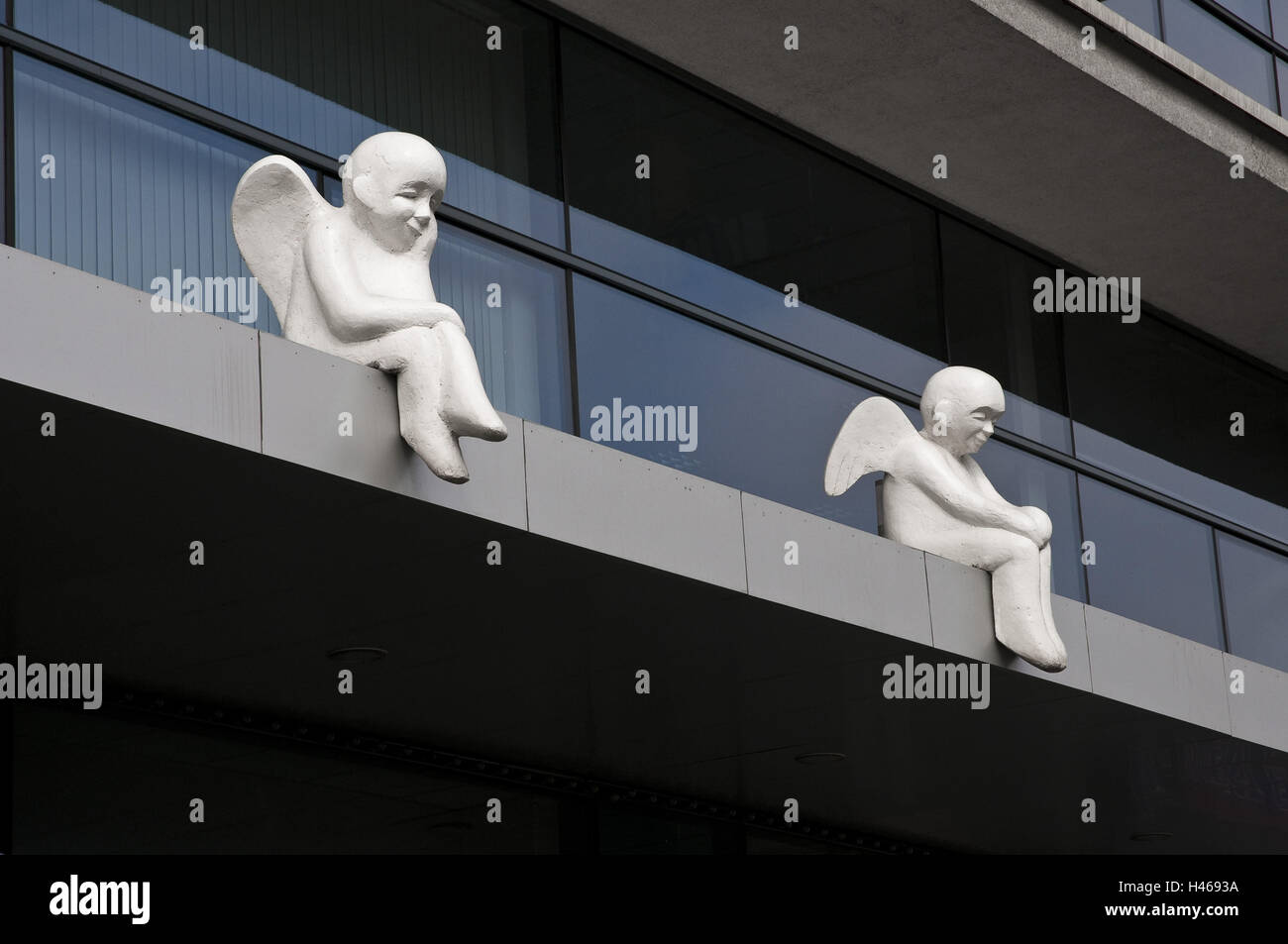 Lithuania, Vilnius, Svitrigailos street, projecting roof, figures, guardian angels, Stock Photo