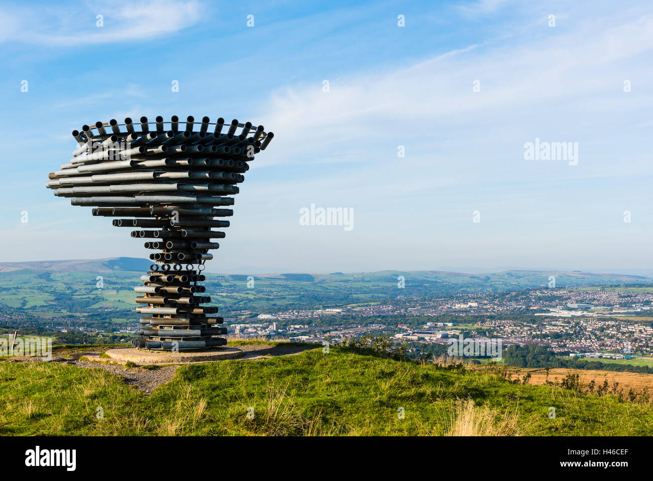 The Singing Ringing Tree, a panopticon on Crown Point in the Lancashire Pennines, looking towards Burnley and Pendle Hill Stock Photo