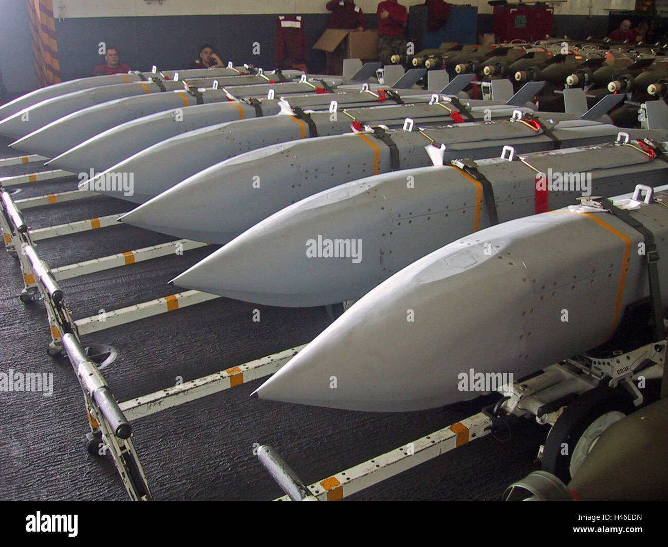 24th March 2003 Operation Iraqi Freedom: Glide bombs on their trolleys on the hangar deck of the USS Abraham Lincoln. Stock Photo
