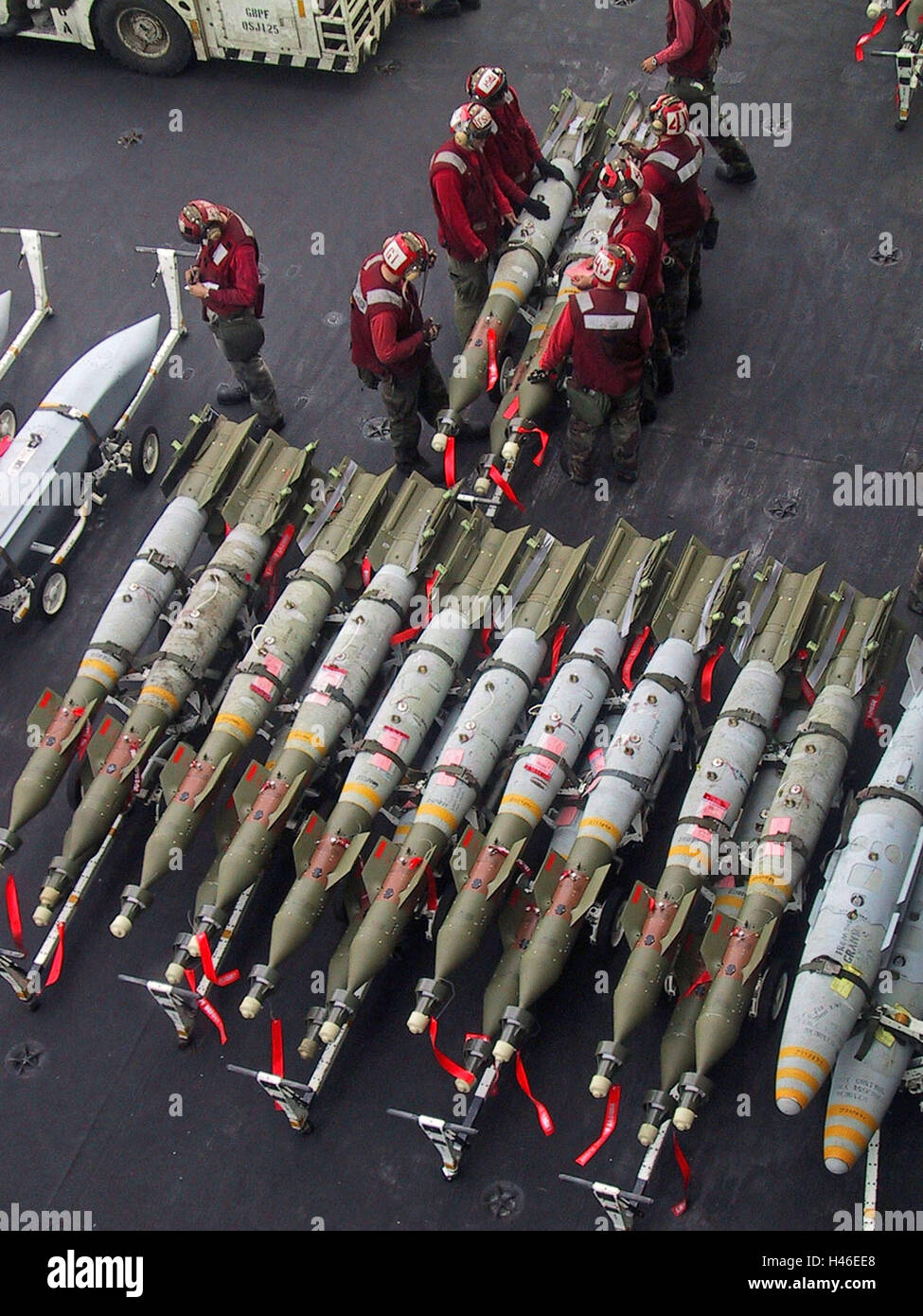 31st March 2003 Operation Iraqi Freedom: bombs on their trolleys on the flight deck of the U.S. aircraft carrier USS Abraham Lincoln. Stock Photo