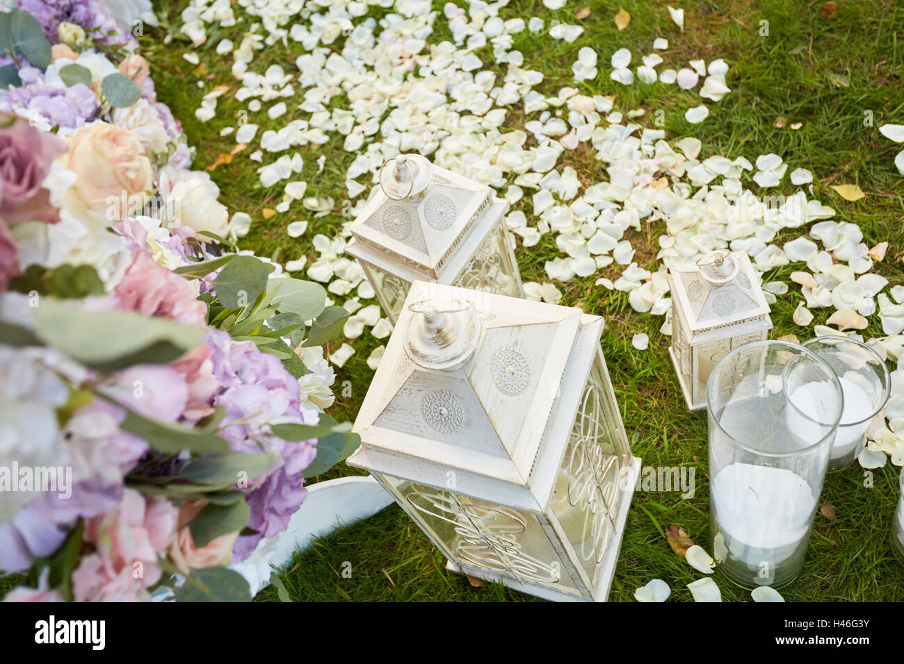 Wedding candles decoration near the arch with flowers Stock Photo Alamy