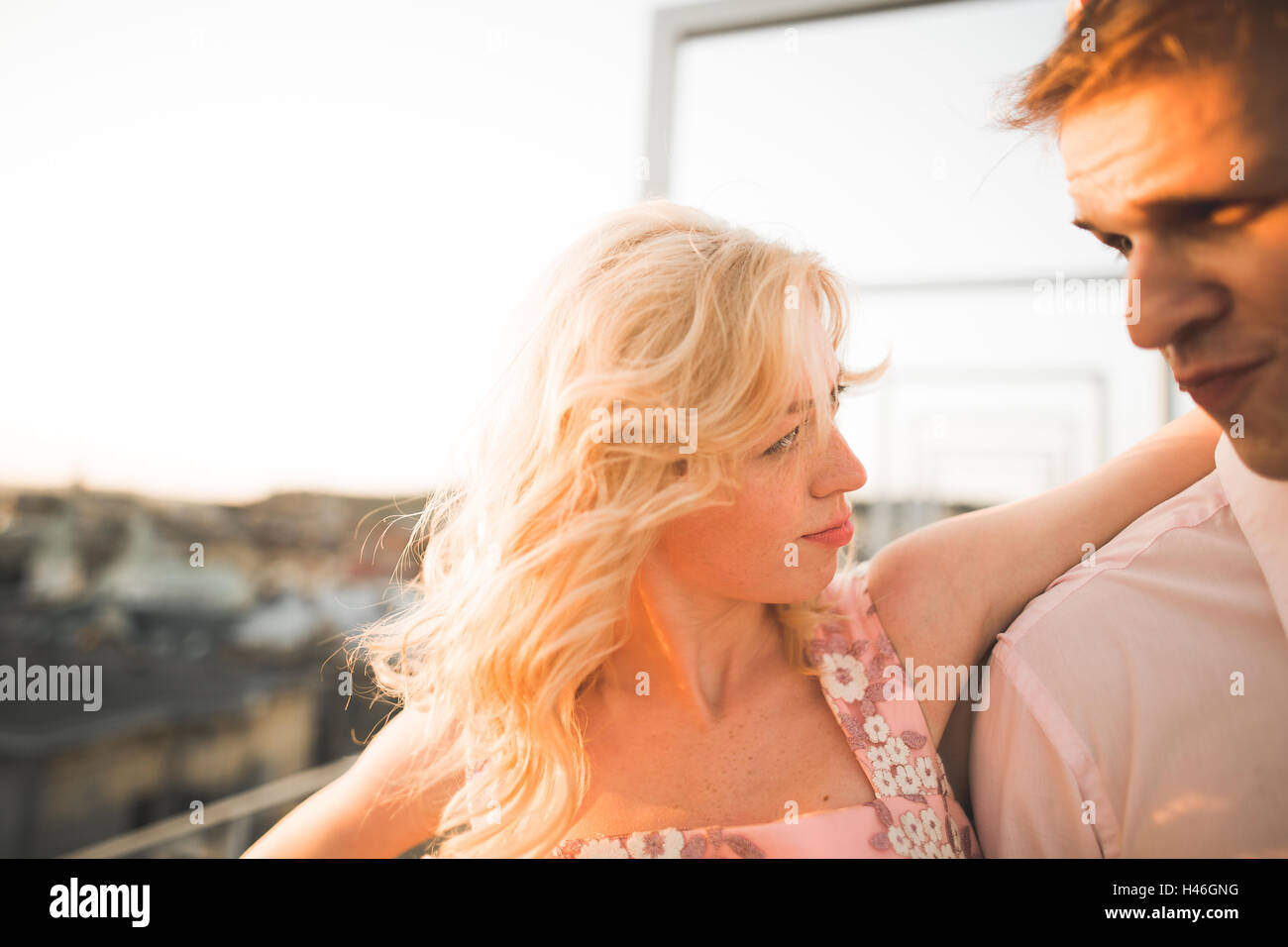 Handsome male kissing woman on hi-res stock photography and images - Alamy